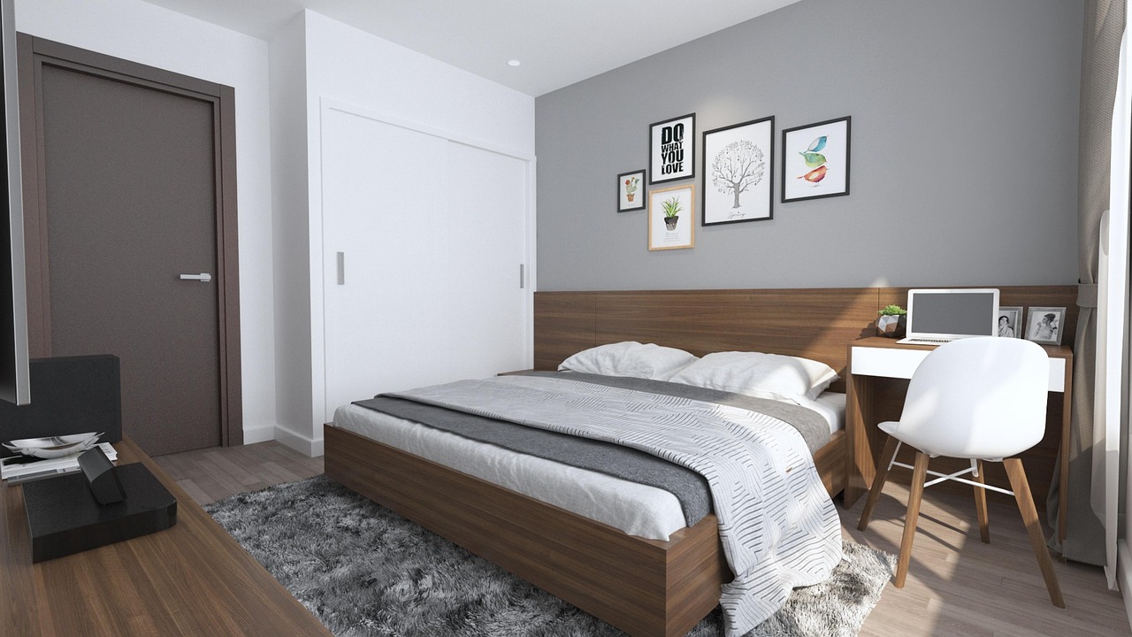 Elegant luxury bedroom suite with premium linens and warm ambient lighting, representing Host & Horizon’s upscale accommodations.