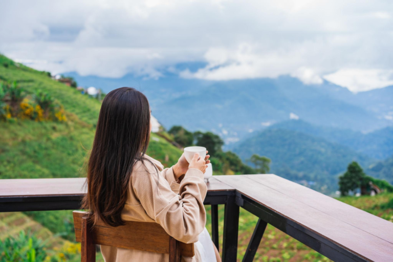 traveler sitting and appreciating scenic view during a peaceful trip