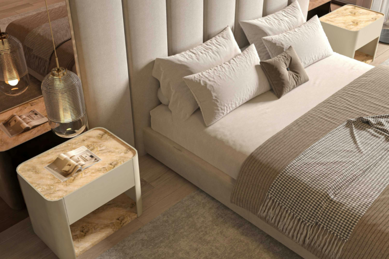 Modern and cozy bedroom with layered pillows, warm lighting, soft neutral tones, and stylish furnishings designed for a relaxing travel stay.