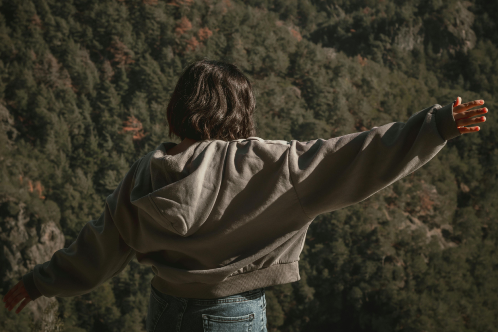 Traveler relaxing in a peaceful mountain accommodation in Baguio for mental wellness and stress relief through travel