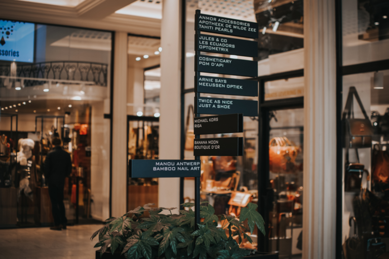 Shopping district showing why choosing the right accommodation location helps reduce travel and transportation costs